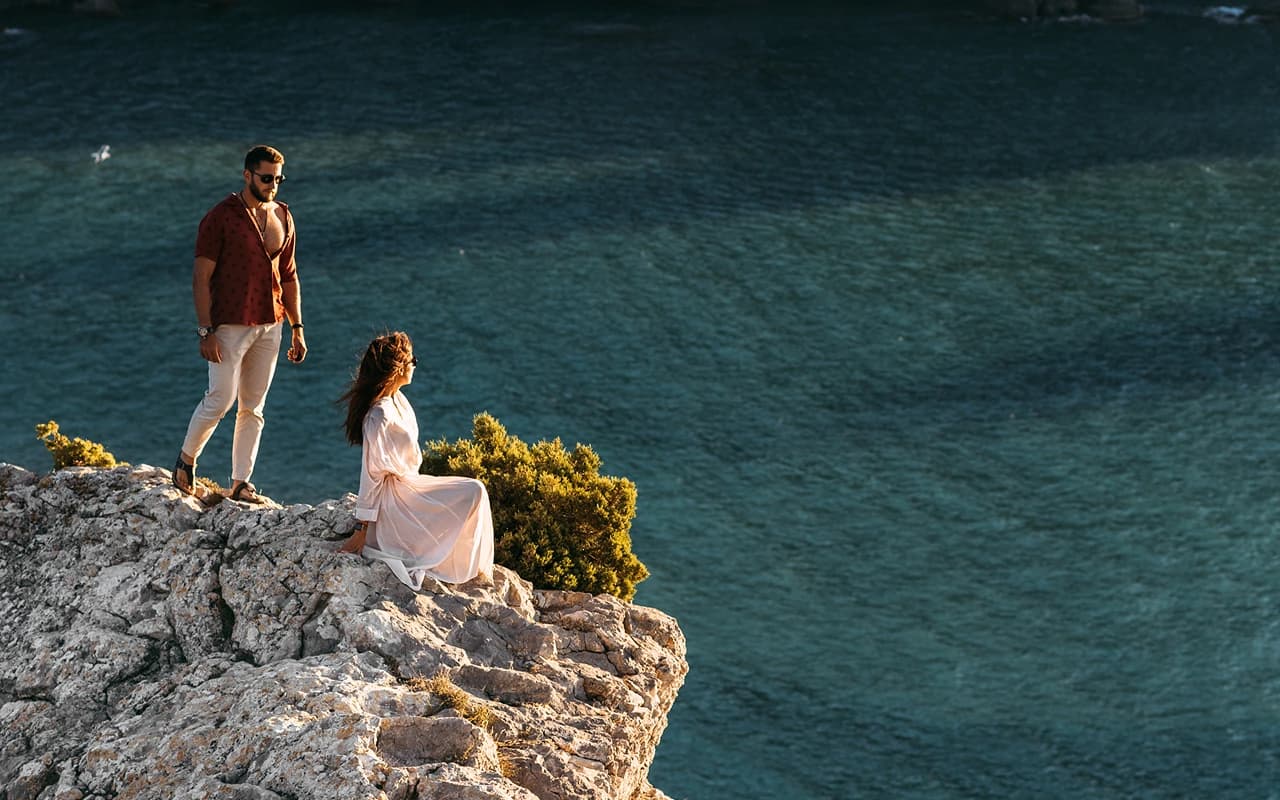 Travelers on a clifftop